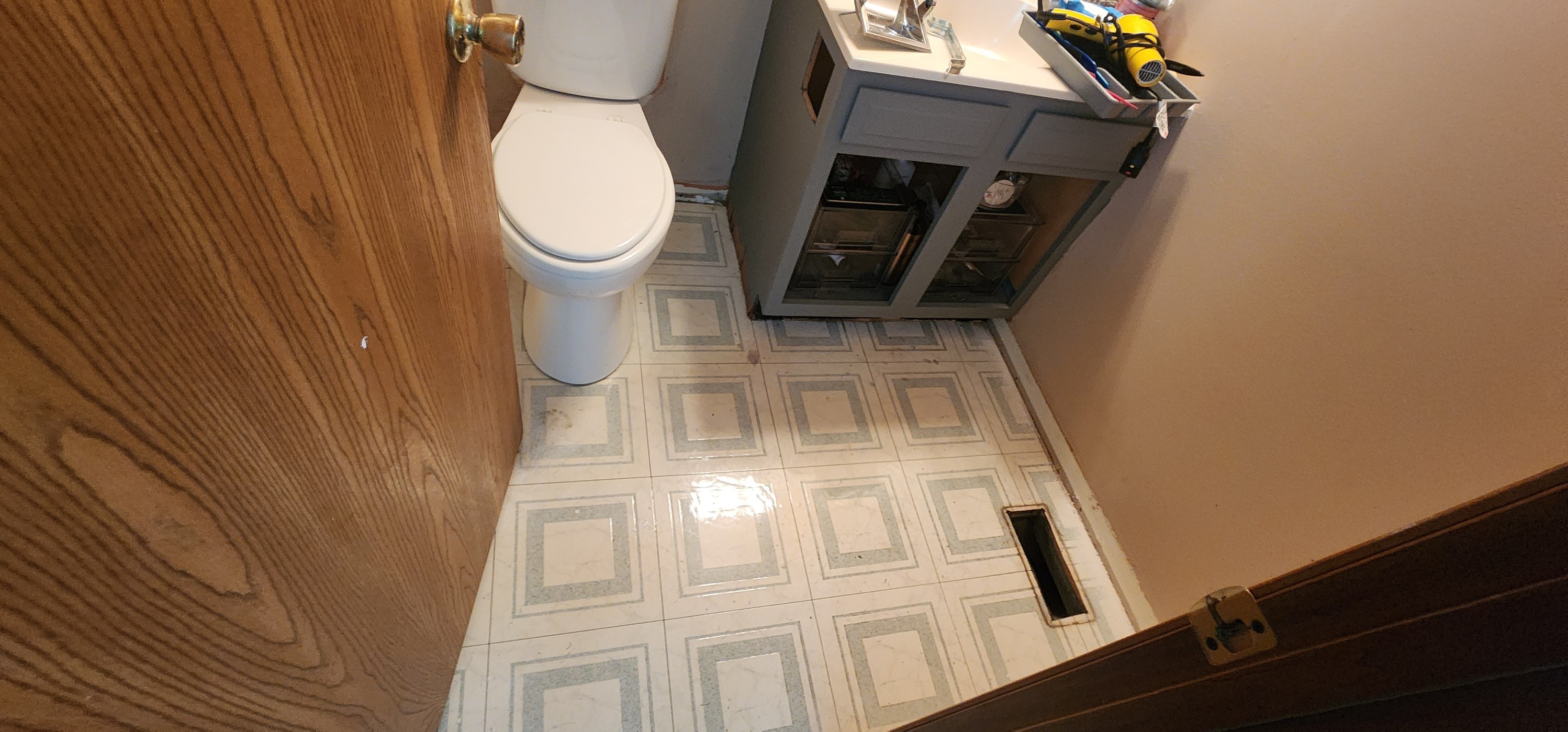 Luxury Vinyl Plank - Bathroom Transformation - Before